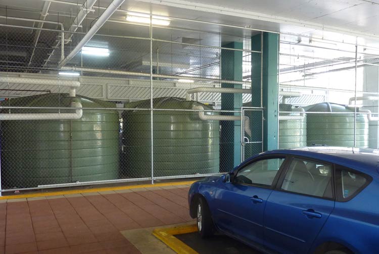 4 X 22,700L Water Tanks within Shopping Centre Car-park (supplying toilets)
