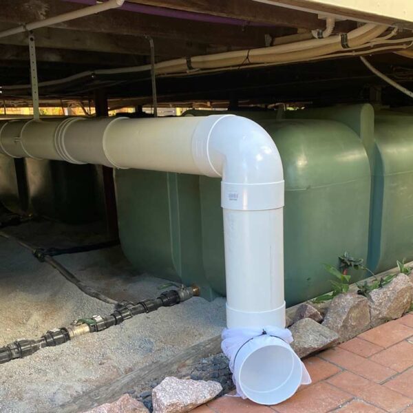 Duraplas UD 2000 Litre Underdeck Water Tank with Multiple Tanks Plumbed Together Under a Building